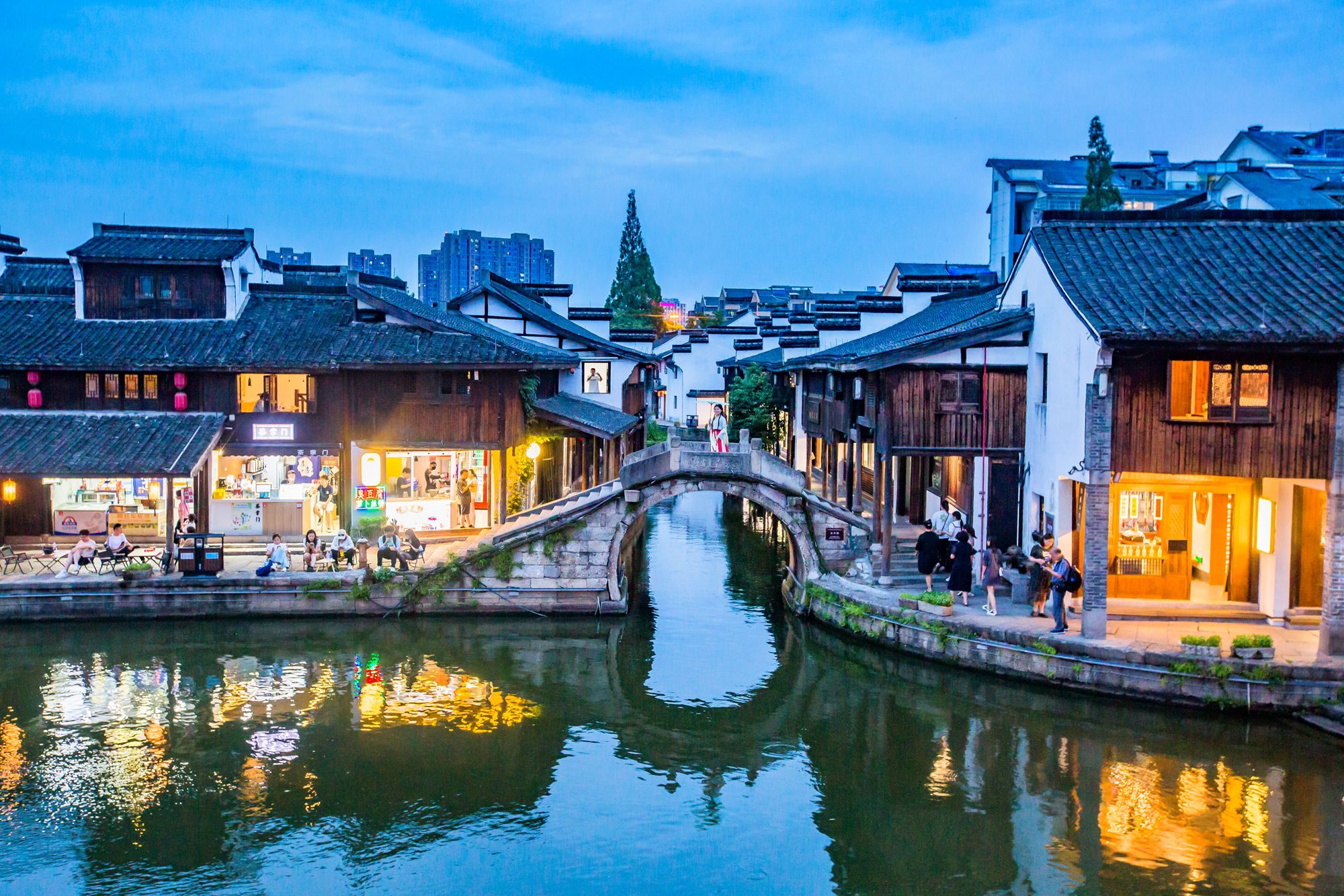 A scenic view of a bridge over a canal in Shaoxing, China.